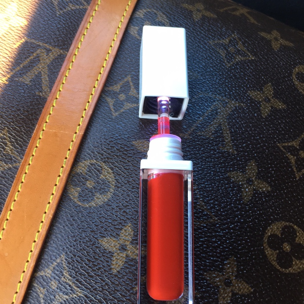 Lip stain goes on wet; turns to a matte lipstick.